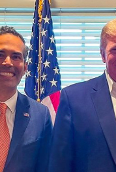 Texas Land Commissioner George P. Bush (left) poses with Donald Trump during his visit to the former president's New Jersey golf club.