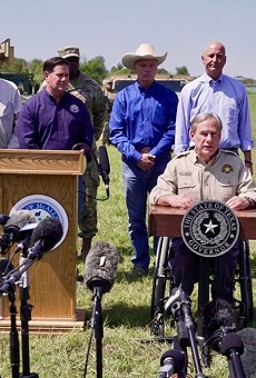 Gov. Greg Abbott speaks to the press at a border photo op earlier this month.