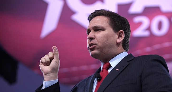 "And, furthermore, Abbott's weewee is thiiiiis big," Florida Gov. Ron DeSantis said during a recent Texas visit. - GAGE SKIDMORE / WIKIMEDIA COMMONS