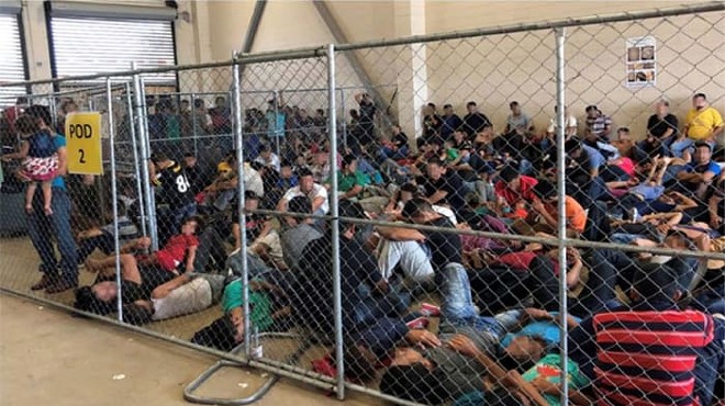 Families huddle together in an overcrowded cell at the Border Patrol’s station in McAllen.
