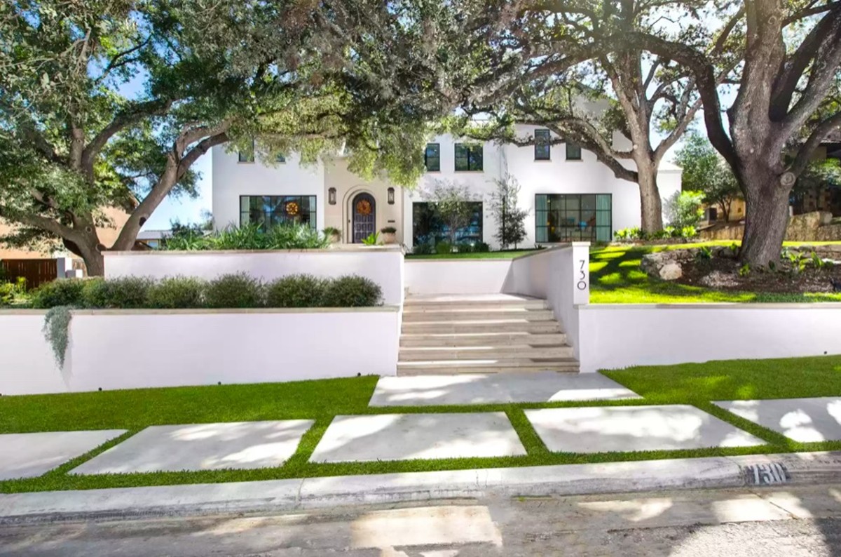 This San Antonio mansion for sale is all white outside, but its interior is full of eye-popping color
