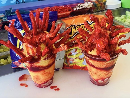 Ice Ice Baby
Multiple Locations, instagram.com/IceIceBabySa
Whether you’re craving fruit slathered in chamoy, Hot Cheetos and Takis as a topping on a  decked-out mangonada, ice cream topped with heaps of candy and other treats, or anything in between — there is no end to the creative Mexican-inspired snacks Ice Ice Baby has lined up for you to choose from.