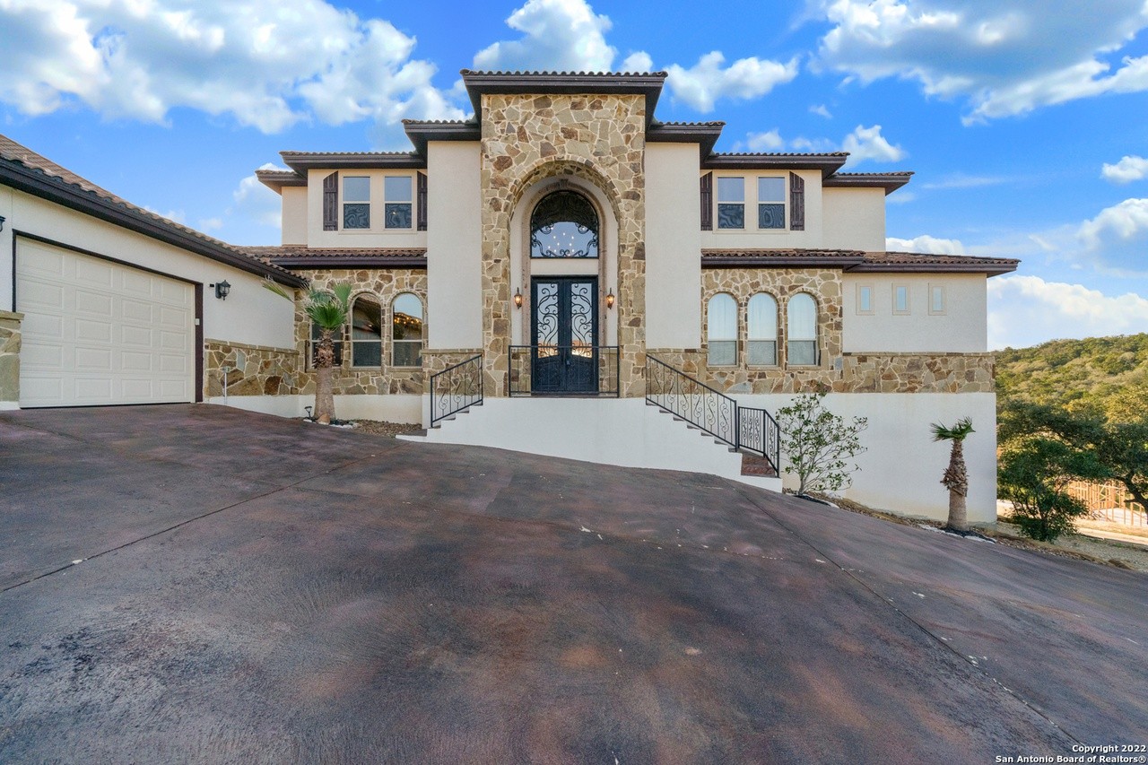 A San Antonio home with balcony views of the Hill Country has hit the market for $1.2 million