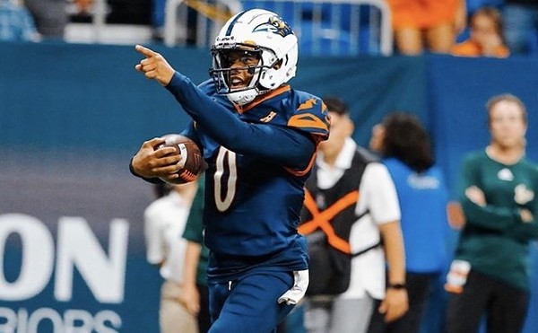 Former Roadrunners quarterback Frank Harris makes a run during a game last season.