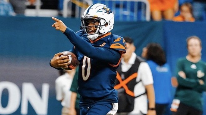 Former Roadrunners quarterback Frank Harris makes a run during a game last season.