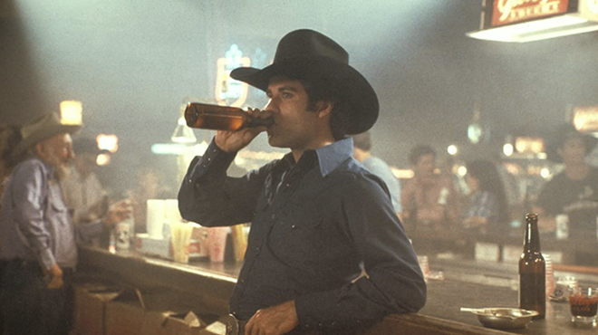 John Travolta in Urban Cowboy .