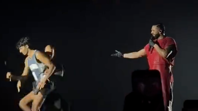 Drake comments on the security staff's sluggishness as they escort a fan from the stage.
