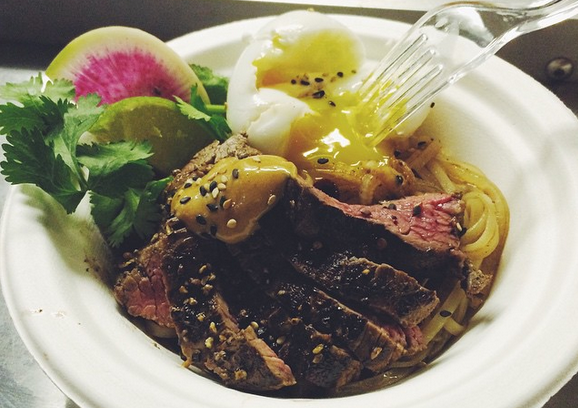 The egg yolk runneth over these tasty noodles from LocaVore food truck. - JESS ELIZARRARAS