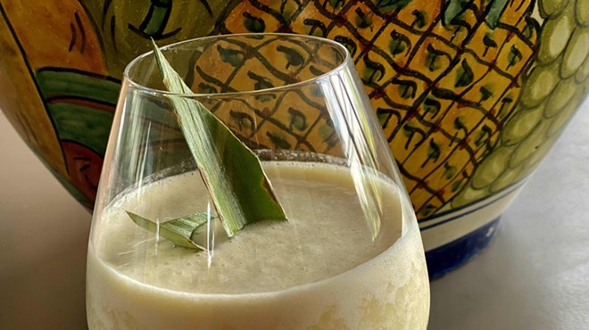 This serving piña colada flaunts its tropical flavors.