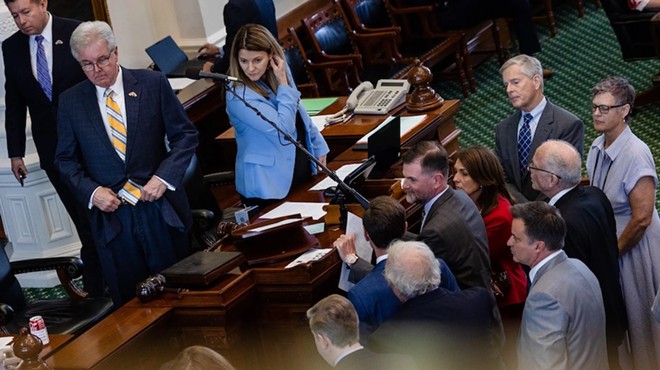 State senators discuss a Point of Order on an amendment to the SJR 1 property tax bill to include a bonus for Texas teachers, with Lt. Gov. Dan Patrick on the Senate floor during the first day of the second special session at the state Capitol in Austin on June 28.